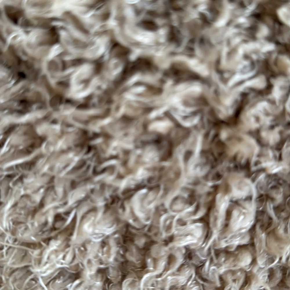 50”x 60” light loosely knit very soft light tan  afghan.